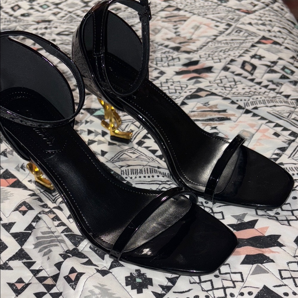 Elegant Black Heels with Gold Accents